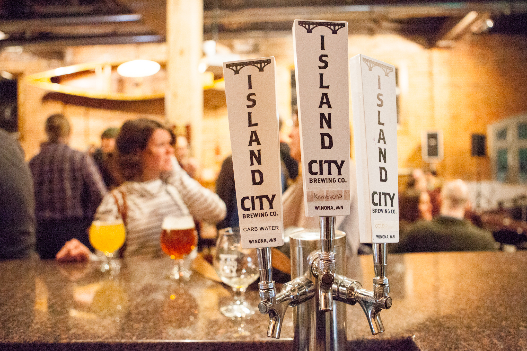 Beer taps at Island City Brewing Company pour unique microbrews