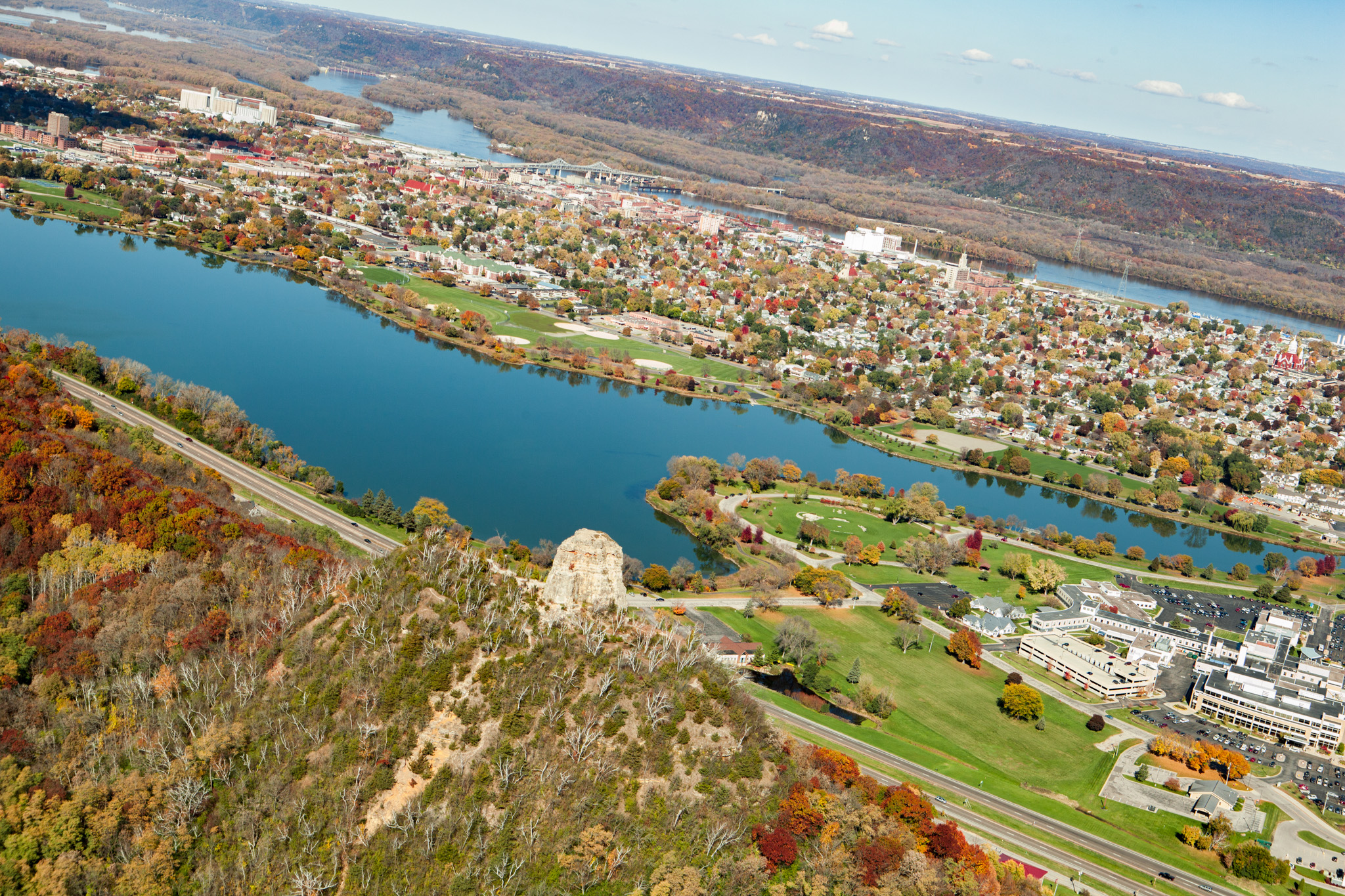 An aerial view of Winona shows Sugar Loaf rising high above the city