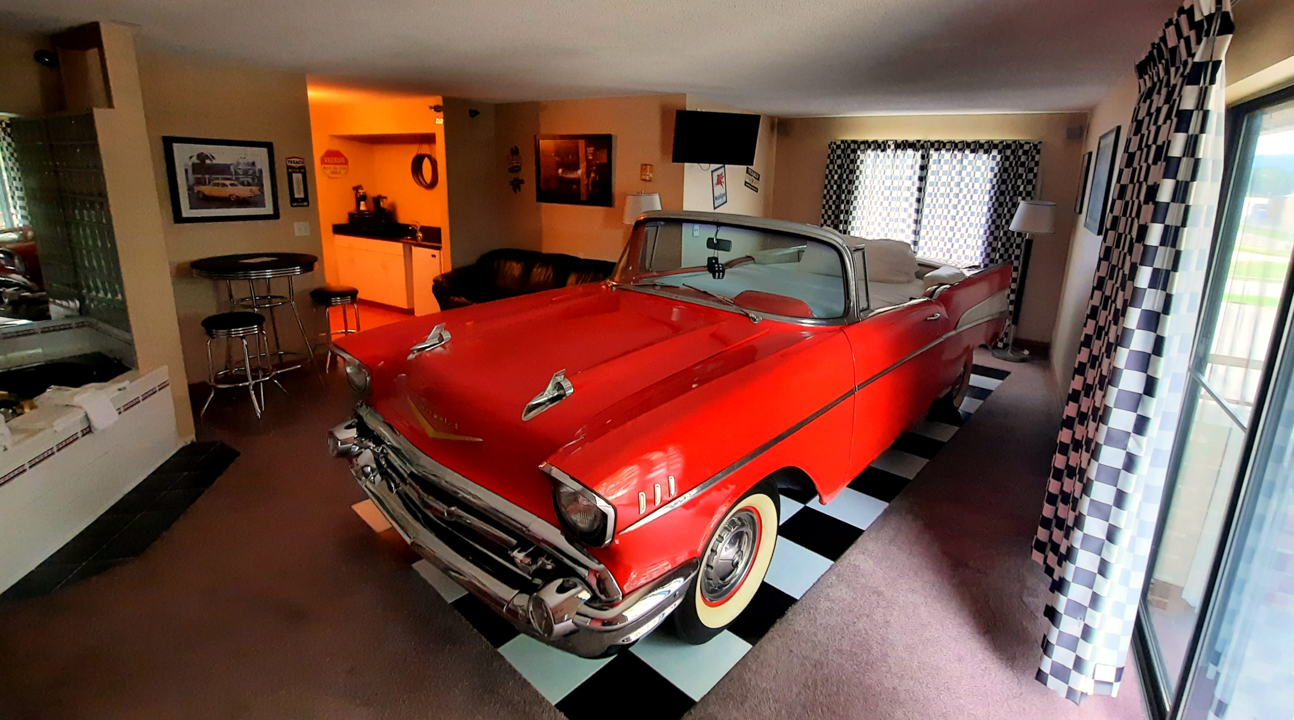 a 1957 Chevy is converted into a bed at the Riverport Hotel in Winona