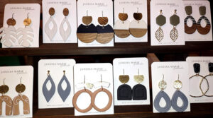 Locally-made earrings inside the downtown shop of ClaraLouise in Winona, Minnesota.